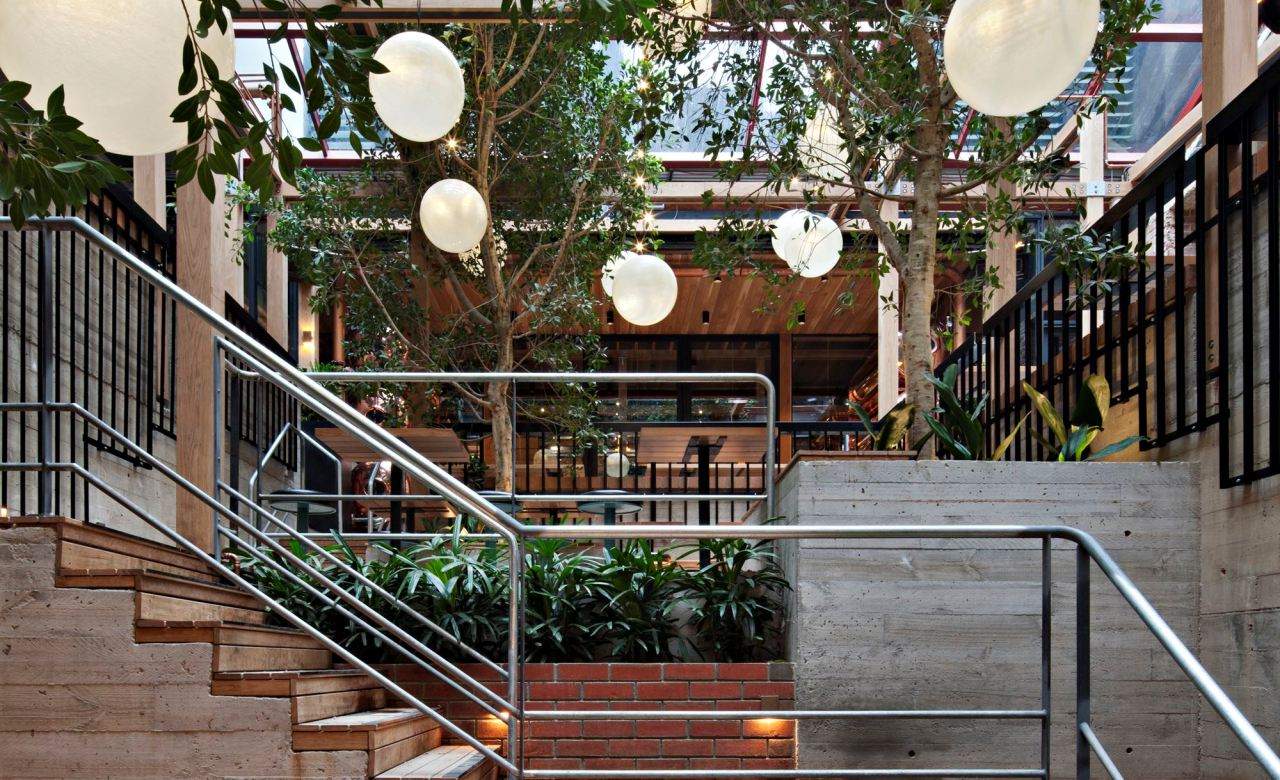 eco friendly hotel lobby garden